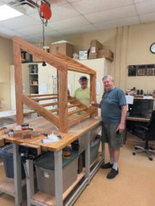 Robson Ranch Texas Woodworker's club members Frank Hunter and Greg Kohn with the golf rack they made for the Pro Shop